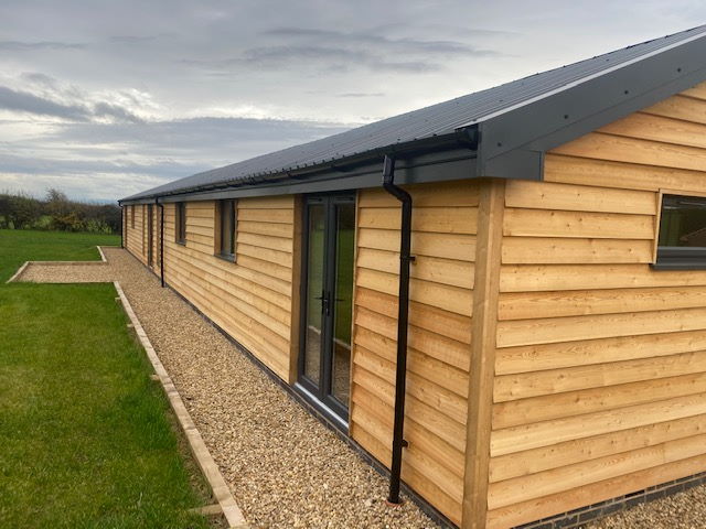 60 Co2 Larch® Feather Edge Cladding